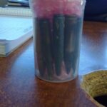 Police arrest two, seize guns and drugs