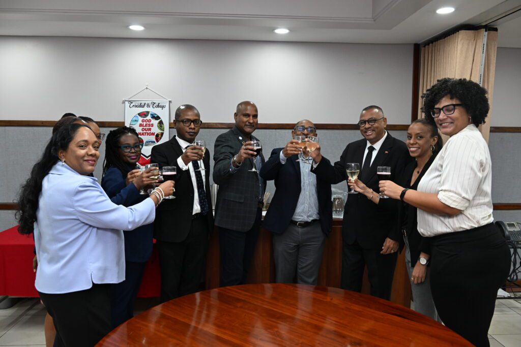 Senator the Honourable Dr. Kennedy Swaratsingh, Minister of Planning, Economic Affairs and Development officially congratulates the EMA team on the accreditation to the GCF.