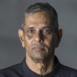 Family of educator and football administrator wants your help