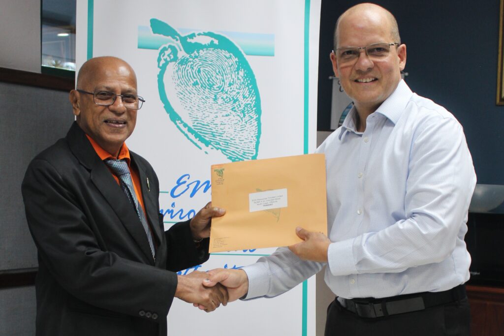 Chairman Ramlal hands over the CEC to Mr. George Vieira – Managing Director – EOG Resources.