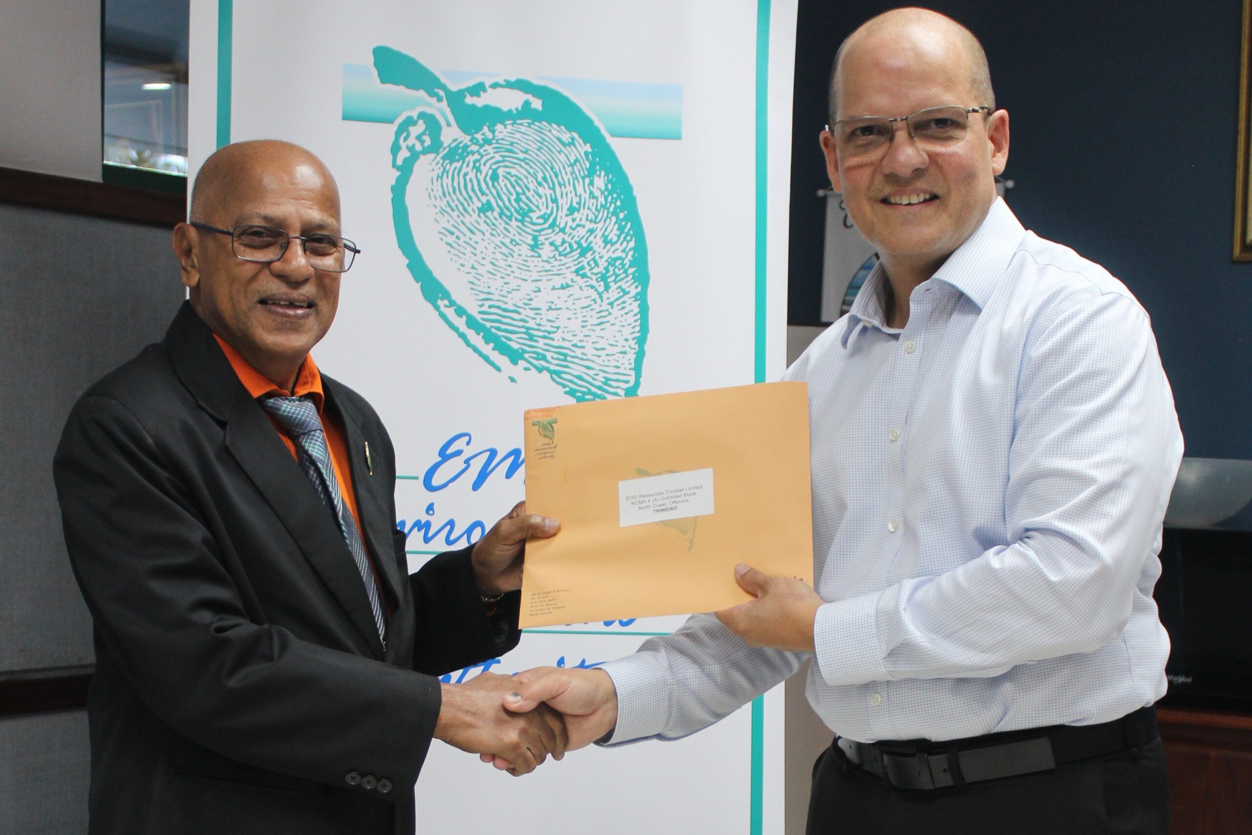 Chairman Ramlal hands over the CEC to Mr. George Vieira – Managing Director – EOG Resources.