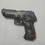 Two Arrested with Firearms as Police Seize Guns, Ammunition and Drugs in Multi-Division Raids