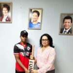 MP Bodoe presents national U17 cricketer with bat