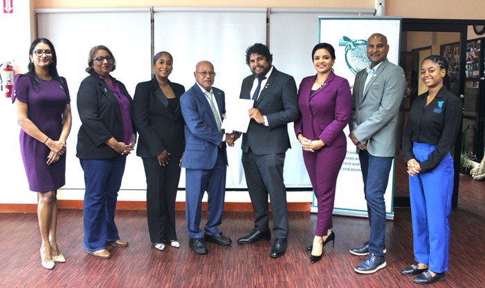 (From left to right) Ms. Shelanna Ajodha, Environmental Programme Officer II, Ms. Sally Maharaj, Environmental Programme Officer III, Ms. Rhea de Gourville, HSE Manager Touchstone Exploration Ltd., Mr.