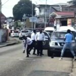 Maxi driver held for assaulting licensing officer