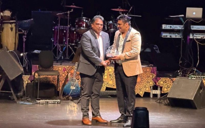 Roodal Moonilal and Rishi Gayadeen