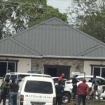 Two national footballers allegedly held