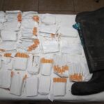 Cigarettes seized after being thrown into PoS jail in a garden boot
