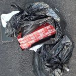Man held for attempting to throw contraband over prison wall
